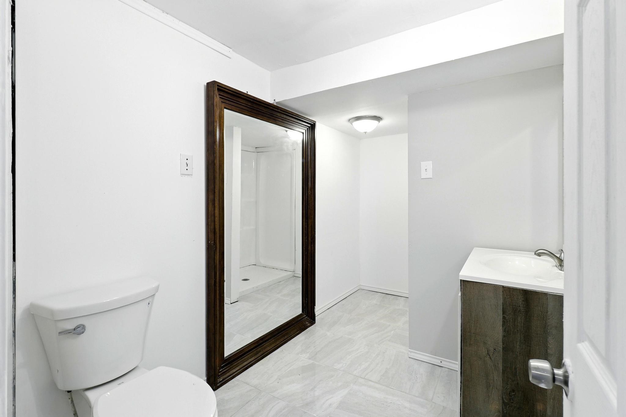 307 Shepard Lane Brenham, TX 77833 - Photo 23 of 47 a bathroom with a toilet shower and sink