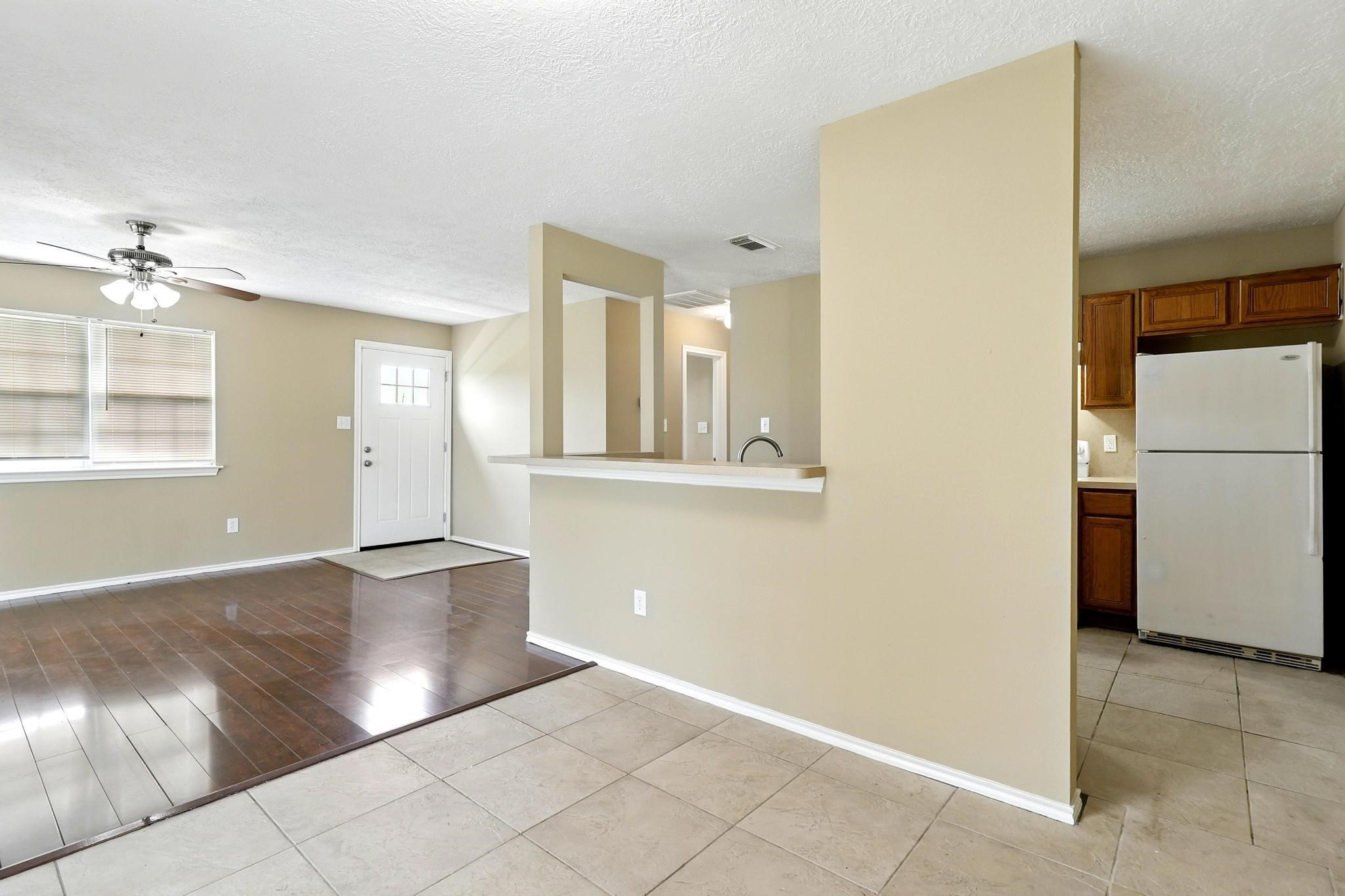 307 Shepard Lane Brenham, TX 77833 - Photo 27 of 47 an empty room with windows and entrance