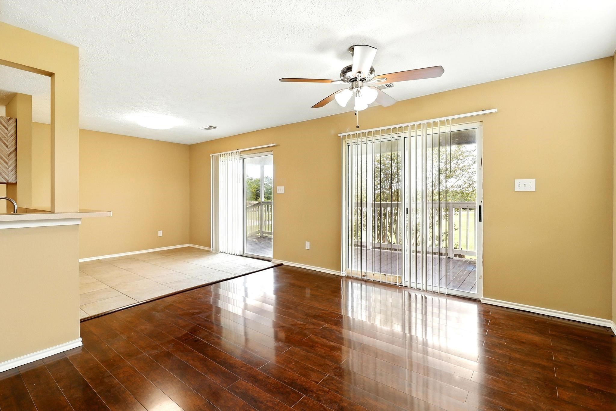 307 Shepard Lane Brenham, TX 77833 - Photo 30 of 47 a view of an empty room with wooden floor and a window