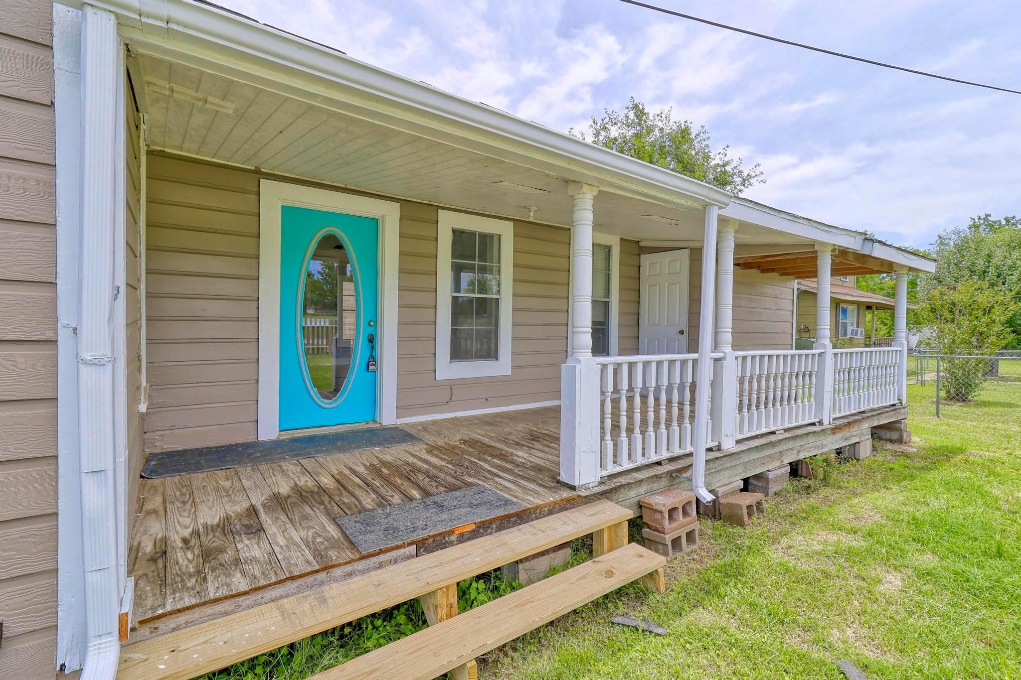 307 Shepard Lane Brenham, TX 77833 - Photo 3 of 47 a view of a house with backyard and porch