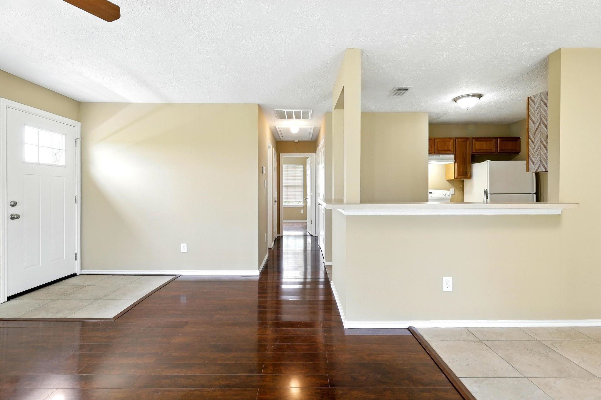 307 Shepard Lane Brenham, TX 77833 - Photo 31 of 47 a view of a living room with wooden floor