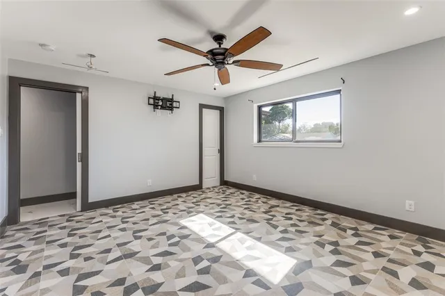 a view of a hallway to a bedroom