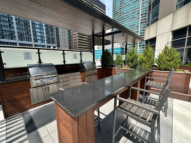 a view of swimming pool with outdoor seating