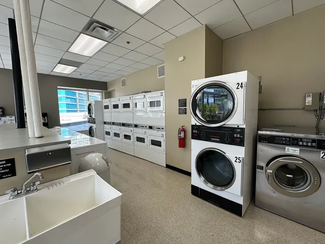 a view of a storage & utility room with washer and dryer