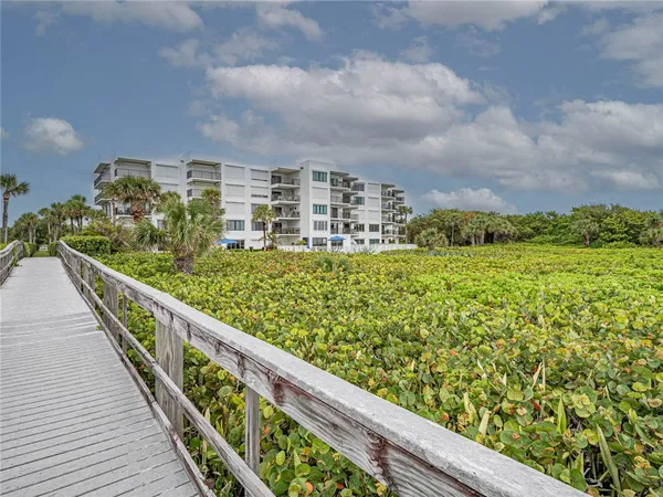 a view of a lake with beach and ocean