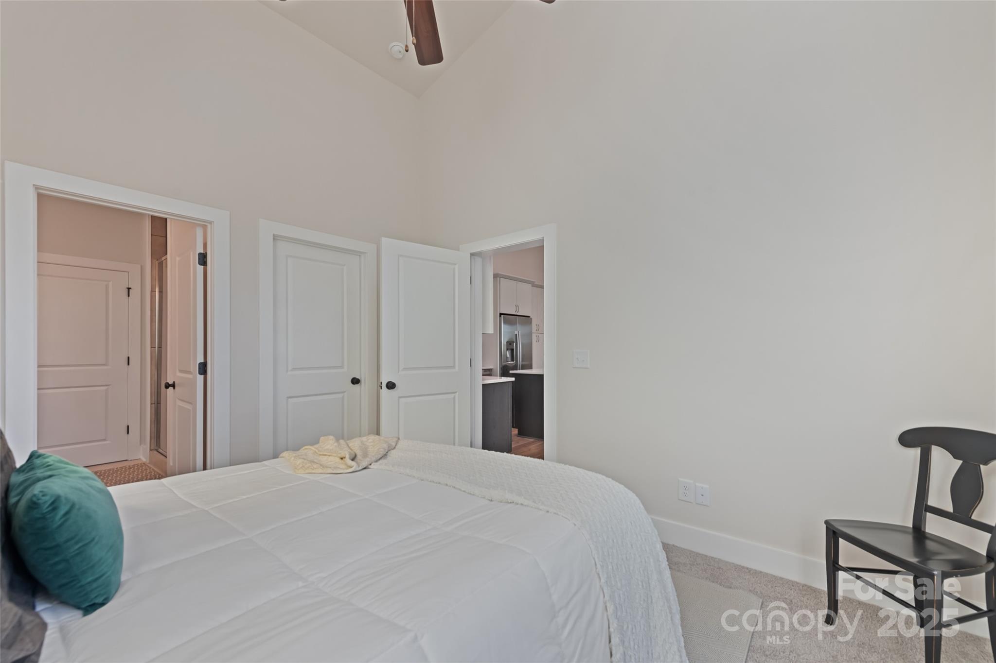 1807 Fisher Crk Road Sylva, NC 28779 - Photo 12 of 37 a bedroom with a bed and a dresser in it