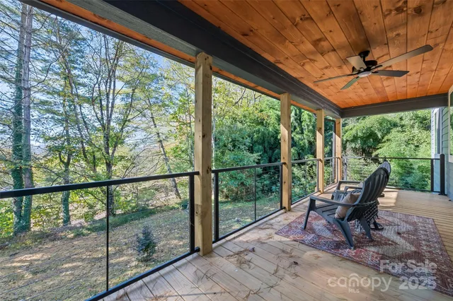 a view of a chairs and table in the patio