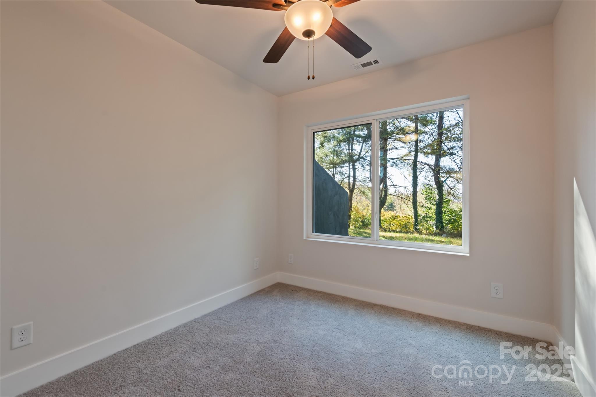 1807 Fisher Crk Road Sylva, NC 28779 - Photo 24 of 37 an empty room with a window