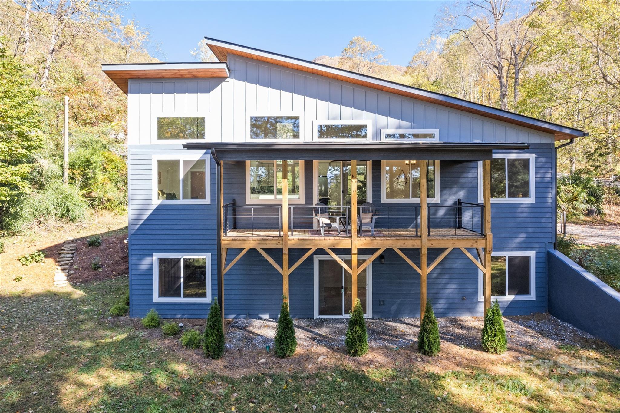 1807 Fisher Crk Road Sylva, NC 28779 - Photo 30 of 37 a front view of a house with glass windows