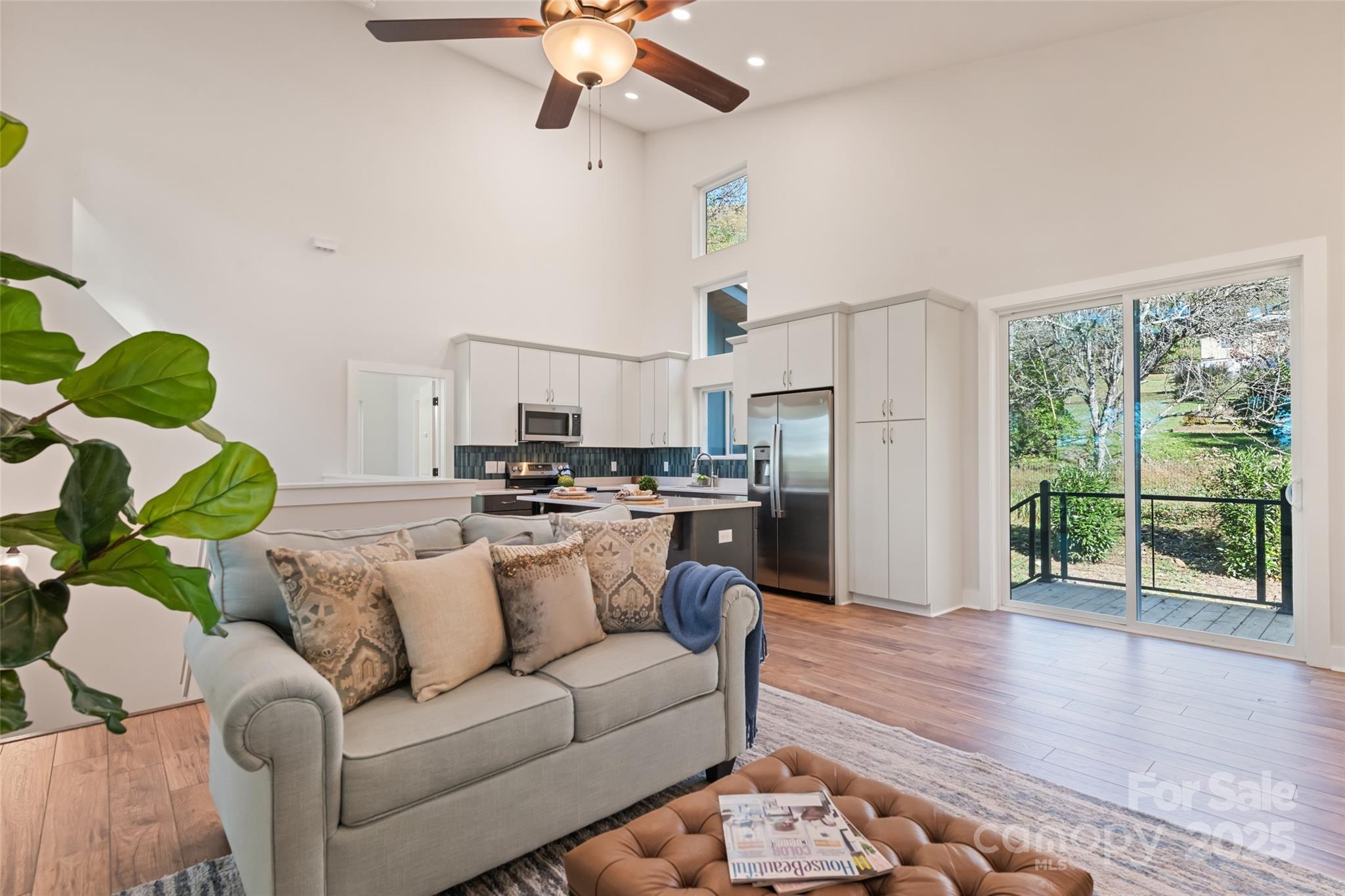 1807 Fisher Crk Road Sylva, NC 28779 - Photo 4 of 37 a living room with furniture and a large window