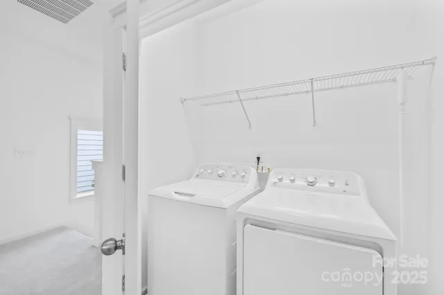 a bathroom with a sink a toilet and shower curtain