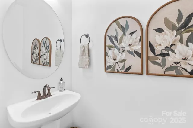 a view of a backyard with sitting area