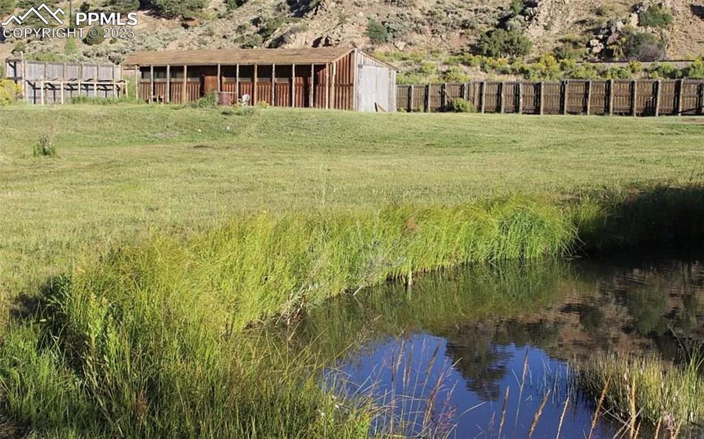 7618 Beekman Road Fort Garland, CO 81133 - Photo 3 of 8 a view of residential houses with yard and green space