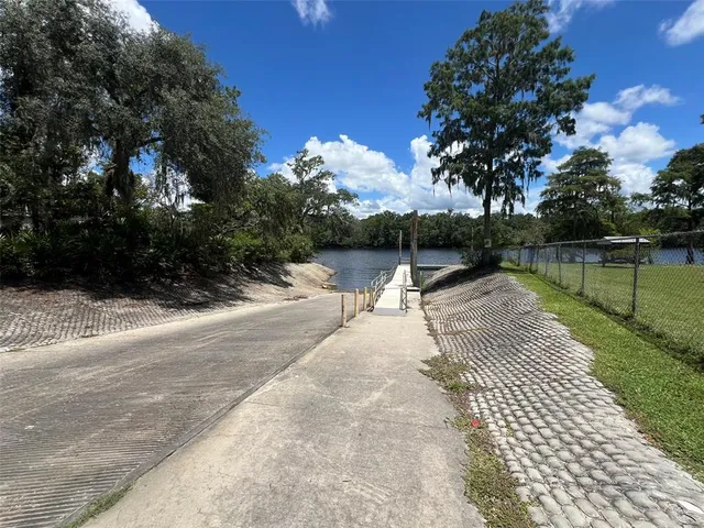 a view of a backyard of the house