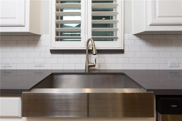 a close view of sink and dishwasher