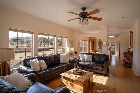 a kitchen with counter top space a sink and cabinets