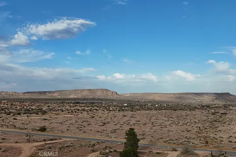a bathroom with a tub and window