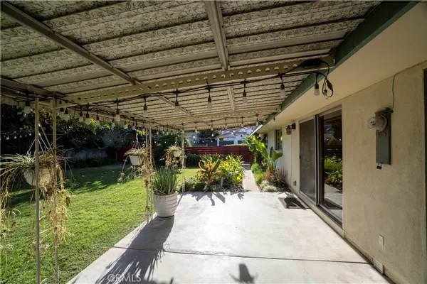 a view of a porch with garden