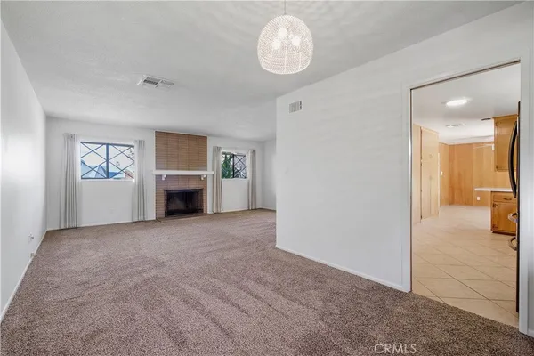 a view of a livingroom with a fireplace