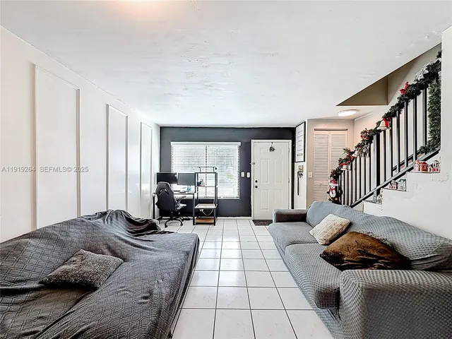 a bedroom with furniture and a couch