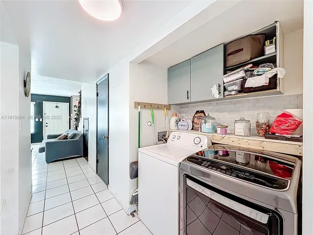 a view of a storage & utility room with washer and dryer