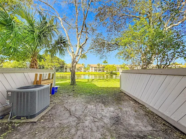 a view of a backyard with garden