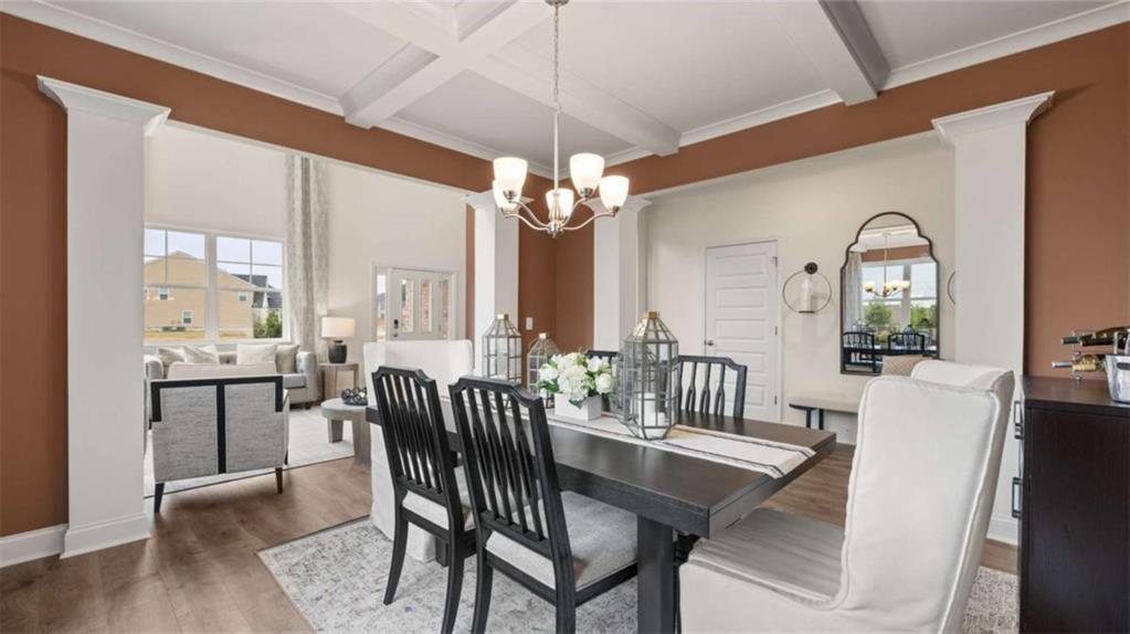 687 Edgar Street Hampton, GA 30228 - Photo 14 of 79 a view of a dining room with furniture window and wooden floor