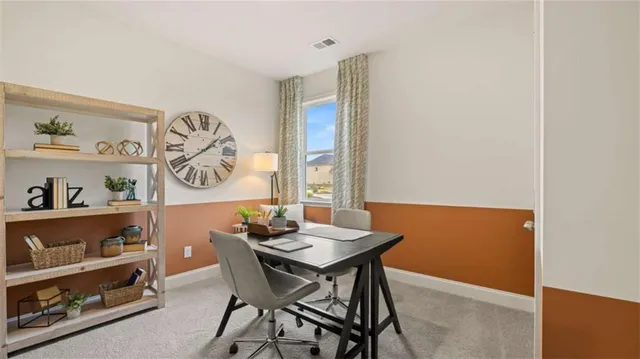 a living room with furniture a rug and a window