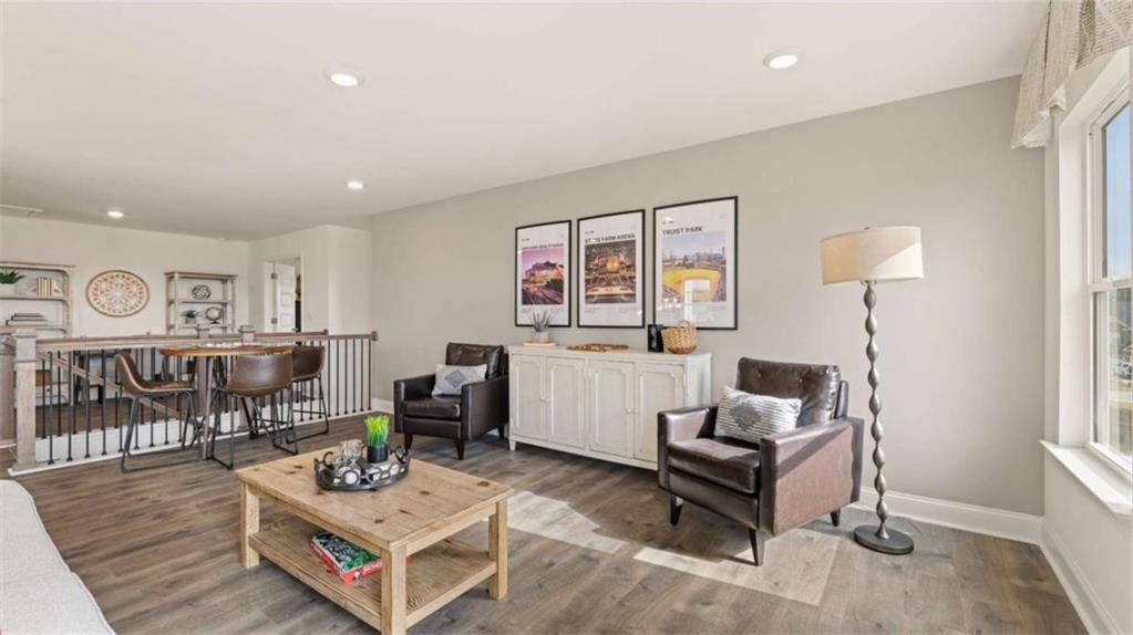 687 Edgar Street Hampton, GA 30228 - Photo 60 of 79 a living room with furniture and a table