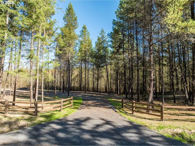 a view of a house with swimming pool