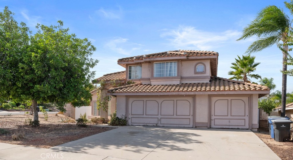 9051 Marmalade Court Riverside, CA 92508 - Photo 1 of 1 a front view of a house with garden