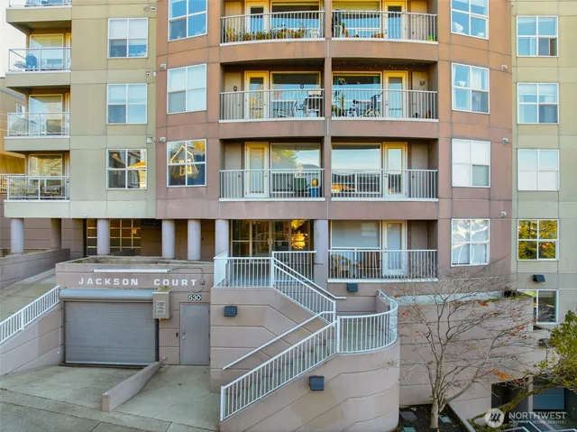a front view of a building with a lot of windows