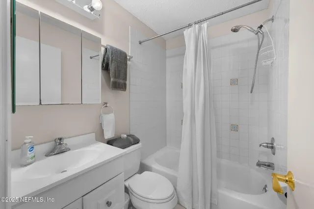a reading room with furniture and book shelf