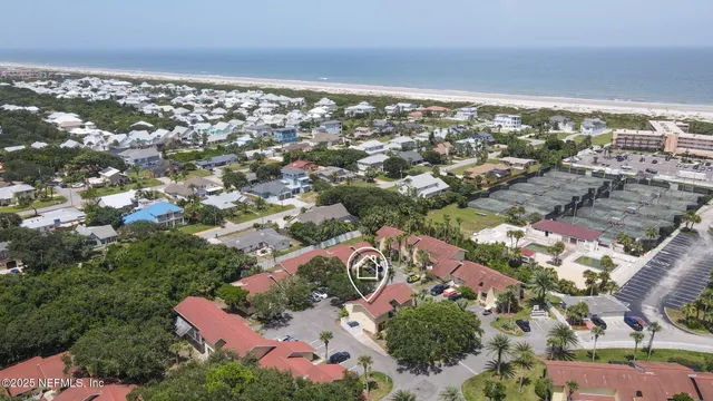 an aerial view of a houses with outdoor space
