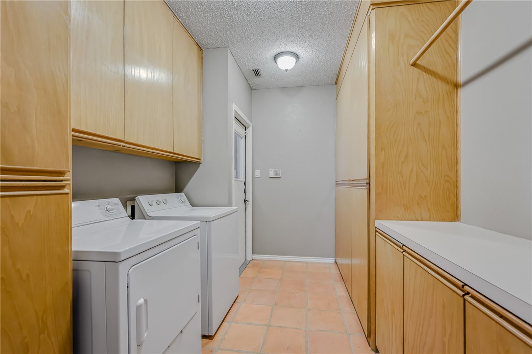 5917 Harvest Hill Road Corpus Christi, TX 78414 - Photo 21 of 40 a utility room with dryer and washer