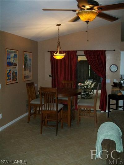 8329 Trillium Road Fort Myers, FL 33967 - Photo 5 of 10 a dining room with furniture and window