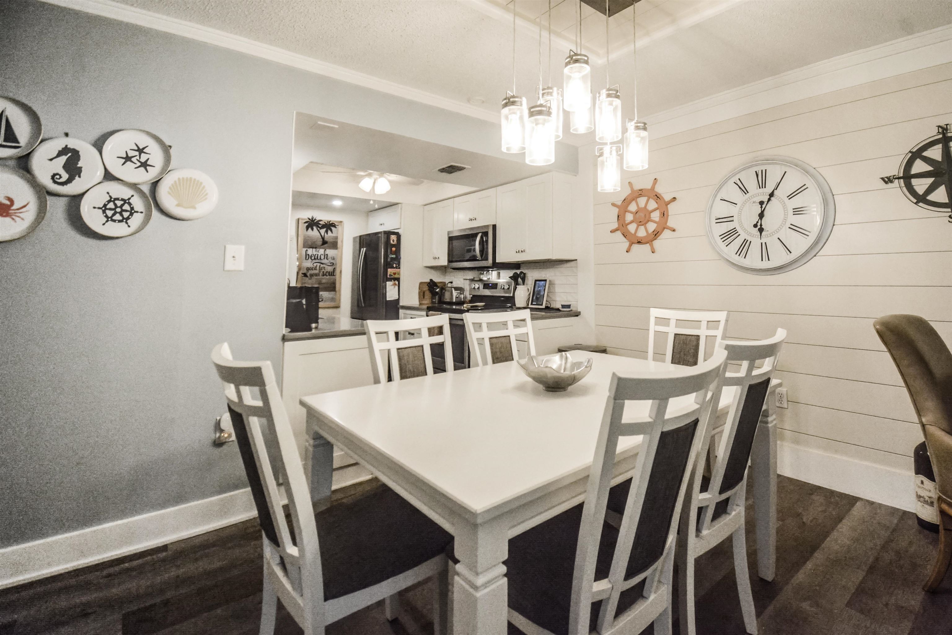 6300 A1A South St. Augustine, FL 32080 - Photo 11 of 42 a view of a dining room with furniture and wooden floor