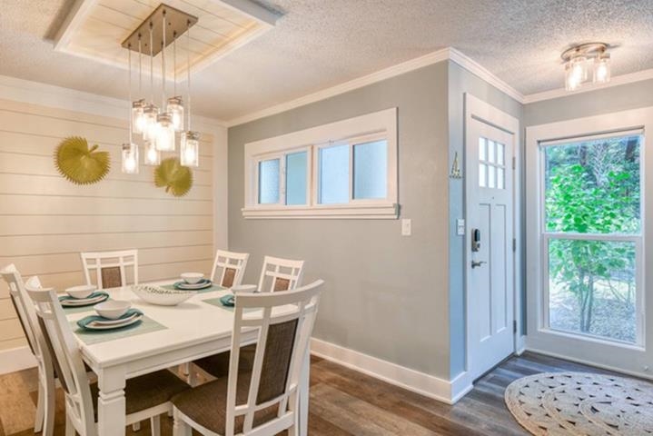 6300 A1A South St. Augustine, FL 32080 - Photo 15 of 42 a dining room with a table and chairs