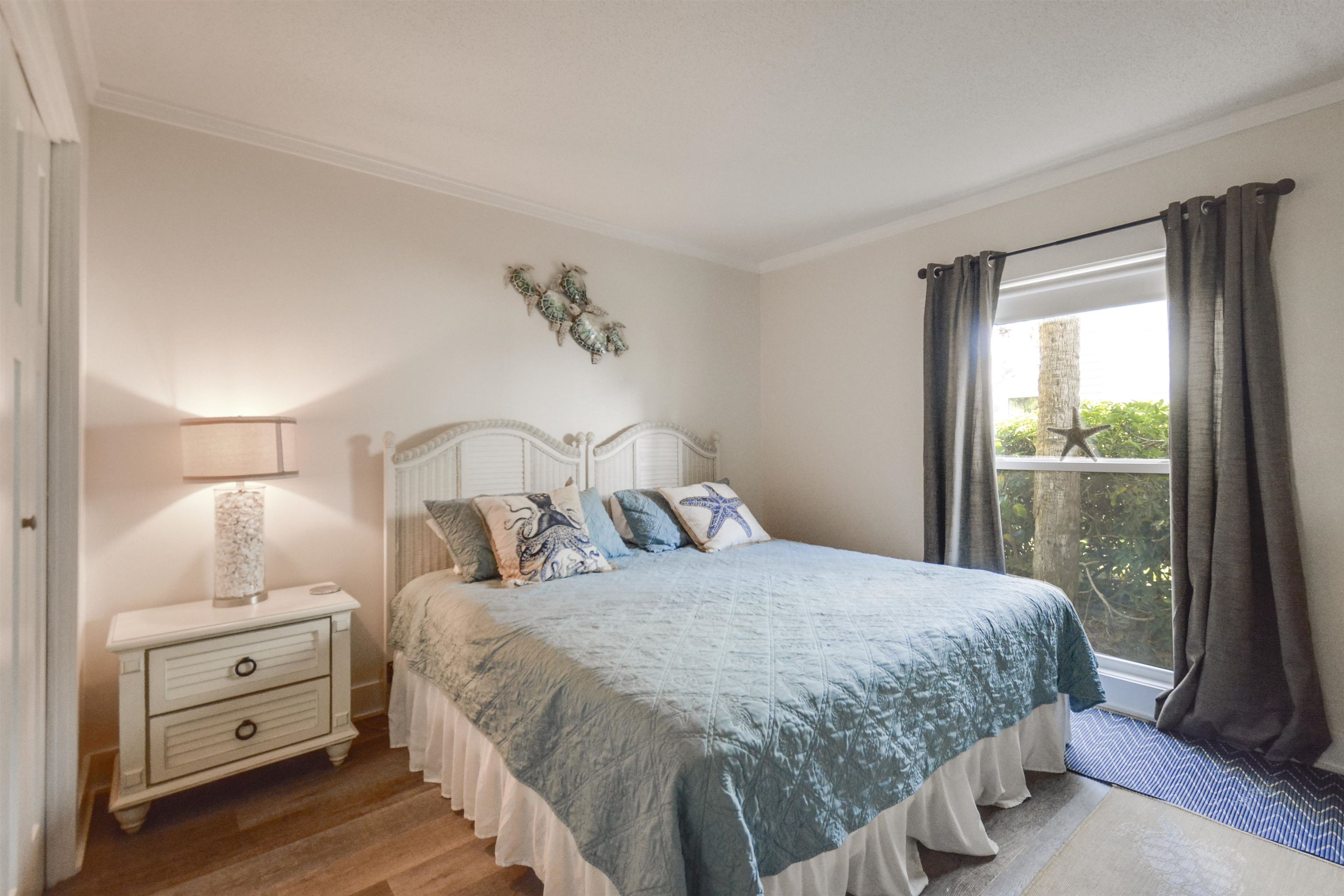 6300 A1A South St. Augustine, FL 32080 - Photo 24 of 42 a bedroom with a bed and a window