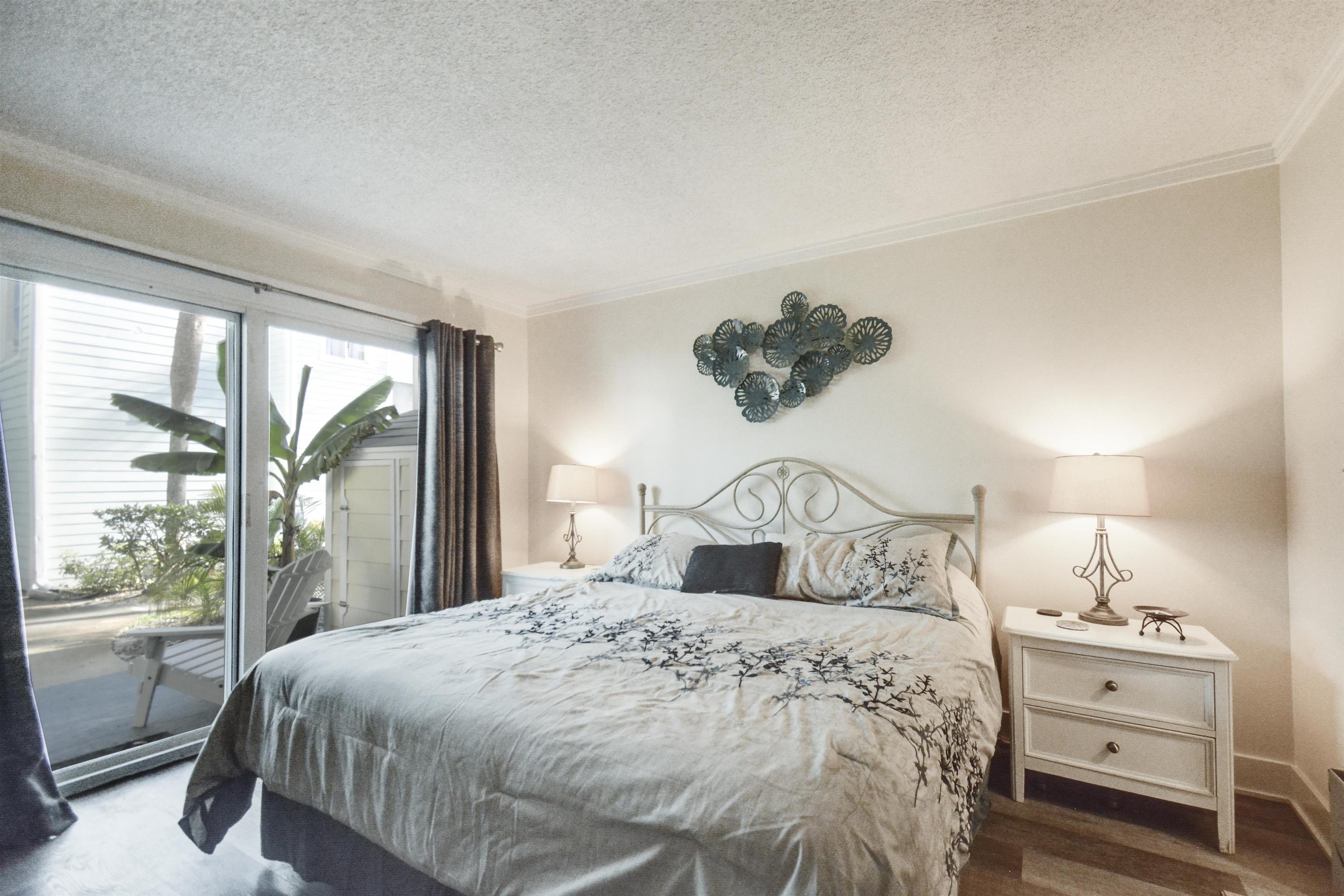 6300 A1A South St. Augustine, FL 32080 - Photo 26 of 42 a bedroom with a bed and a window