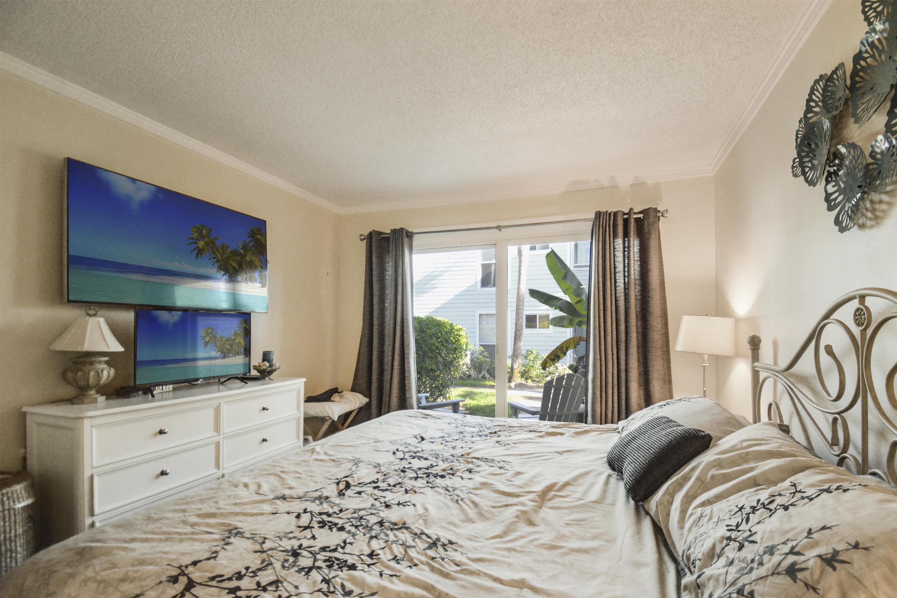 6300 A1A South St. Augustine, FL 32080 - Photo 27 of 42 a bedroom with a bed and a window