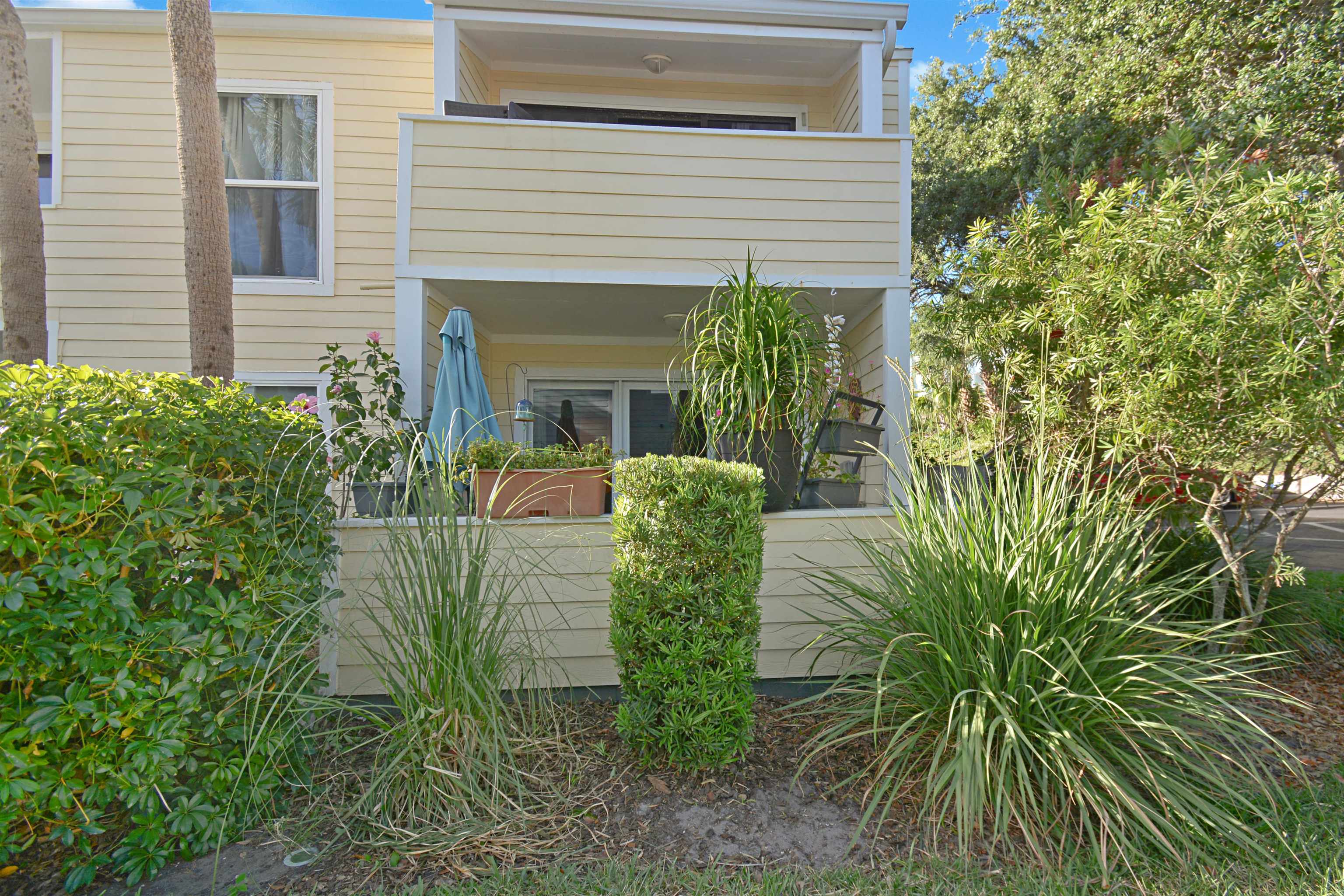 6300 A1A South St. Augustine, FL 32080 - Photo 30 of 42 a view of a chairs in a backyard