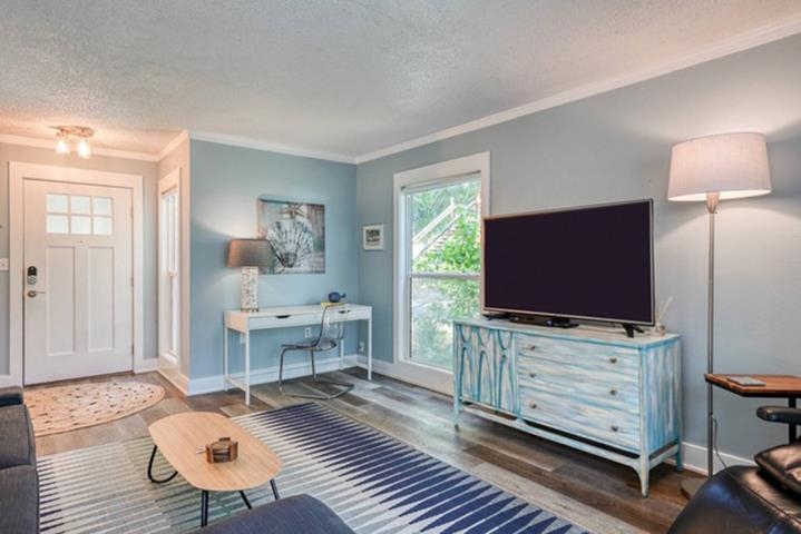 6300 A1A South St. Augustine, FL 32080 - Photo 7 of 42 a living room with furniture and a flat screen tv