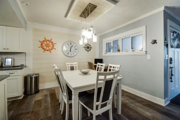 a view of a dining room with furniture