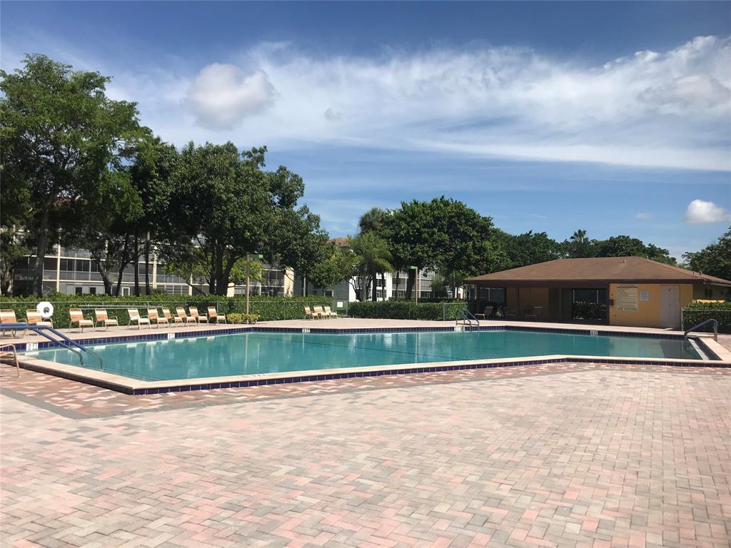 1401 Southwest 135th Terrace, Unit 307H Pembroke Pines, FL 33027 - Photo 12 of 13 a view of outdoor space yard and green space
