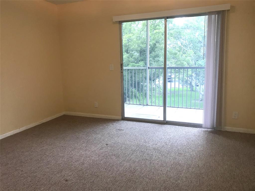 1401 Southwest 135th Terrace, Unit 307H Pembroke Pines, FL 33027 - Photo 6 of 13 a view of empty room with window