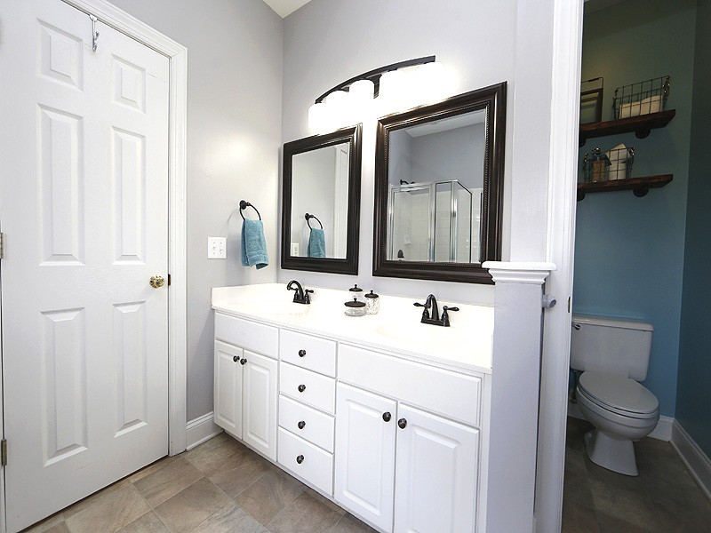 5305 Back Sail Court Raleigh, NC 27613 - Photo 9 of 18 Updated Fixtures...lots of storage under counter. Master Bedroom