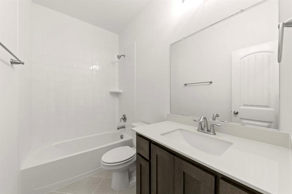 1443 Canadian Lane Van Alstyne, TX 75495 - Photo 14 of 24 15-1443-canadian-ln-van-alstyne-tx-secondary-bathroom