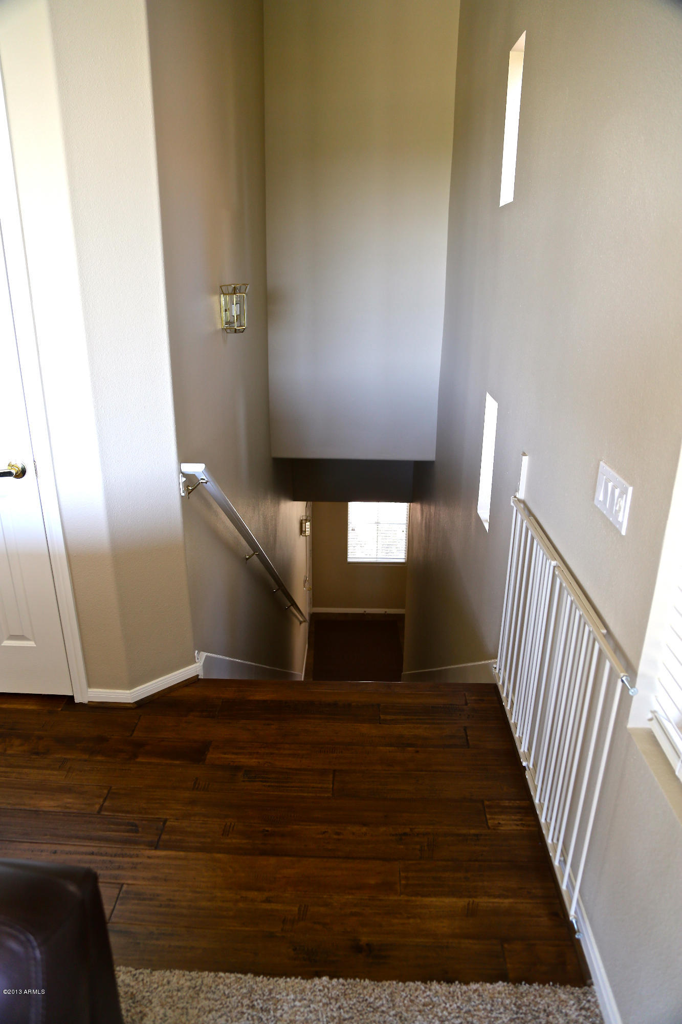 8245 East Bell Road, Unit 226 Scottsdale, AZ 85260 - Photo 39 of 69 STAIRWAY FROM LIVING AREA TO GROUND LVL