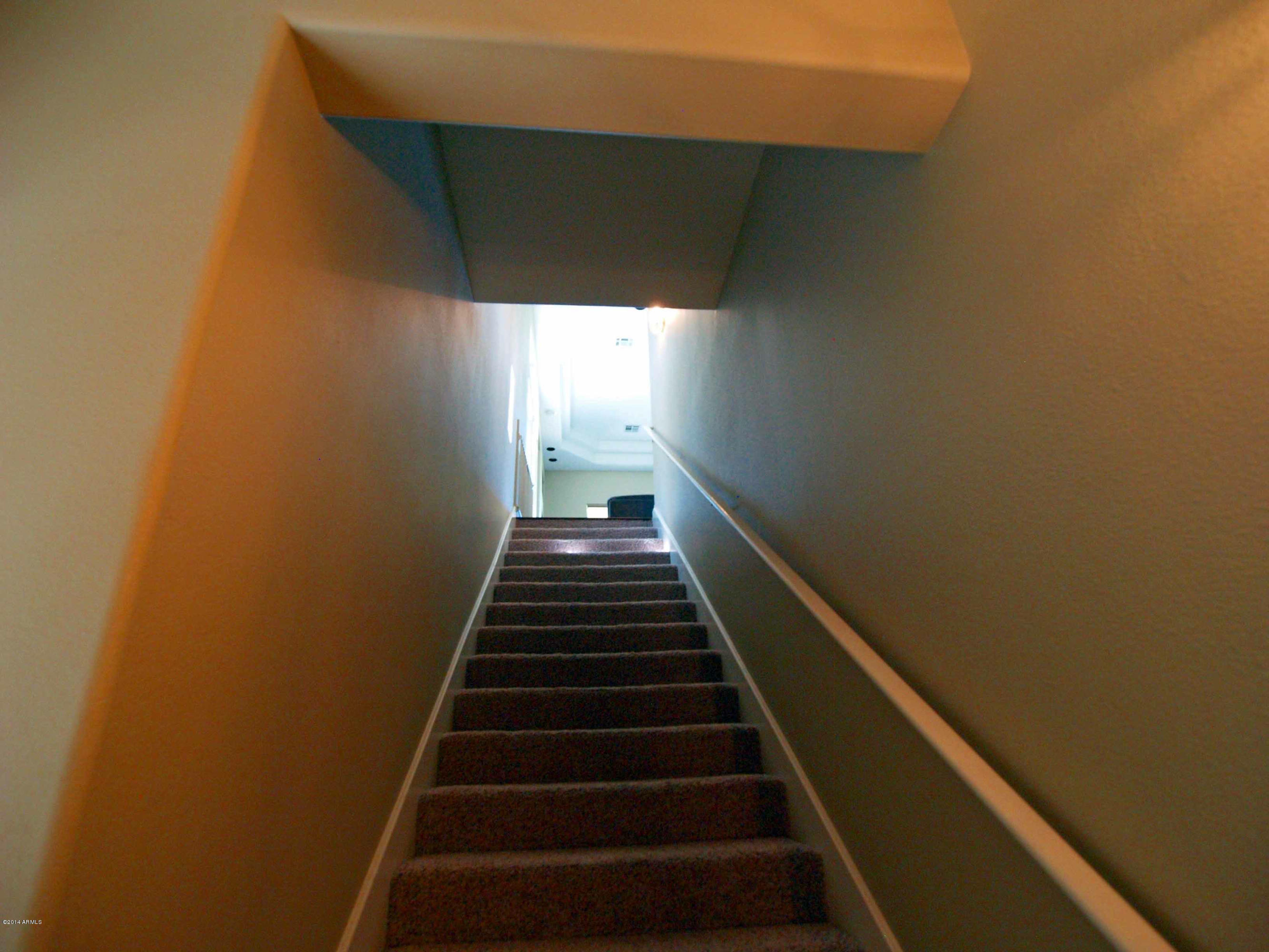 8245 East Bell Road, Unit 226 Scottsdale, AZ 85260 - Photo 6 of 69 STAIRWAY FROM ENTRY TO LIVING AREA